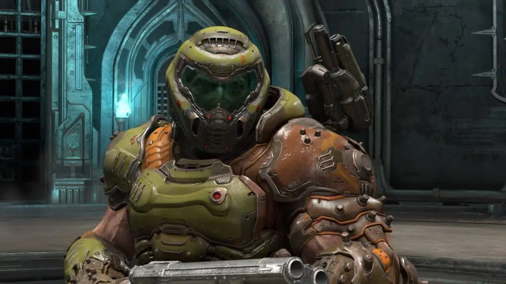 Imagem do doom slayer segurando a arma super shotgun.