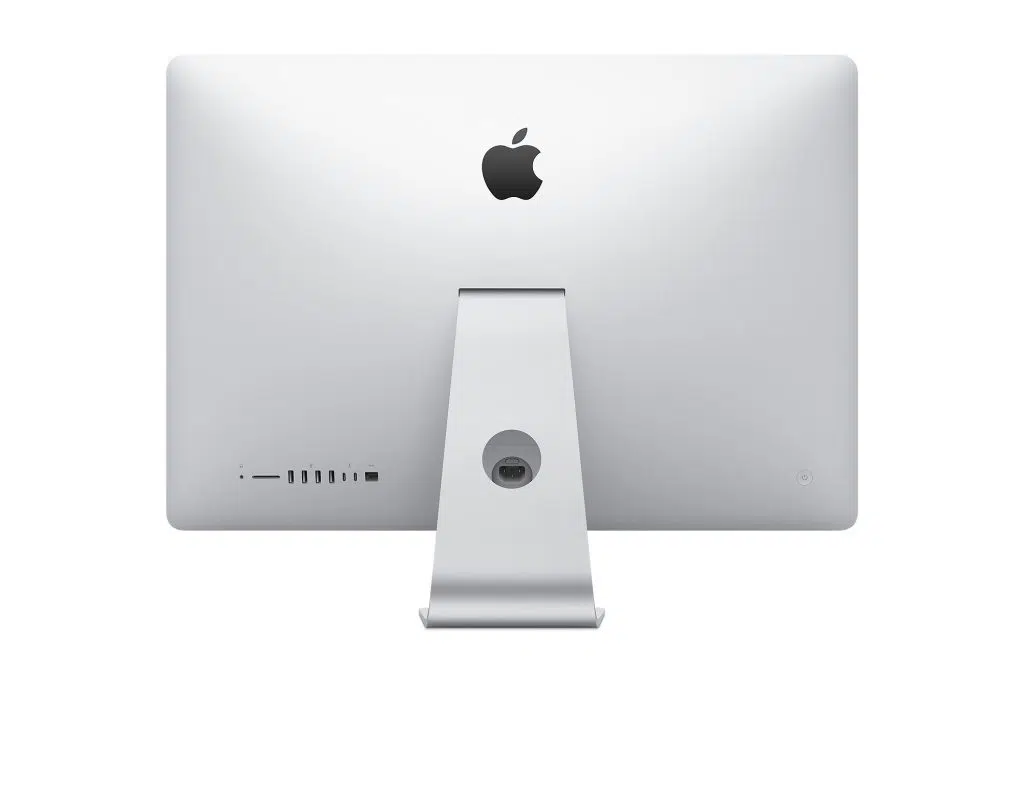 Parte de trás do imac de 27 polegadas, toda branca com o símbolo da apple, uma maçã comida, cinza, na parte superior, e conectores de diversos modelos para fios