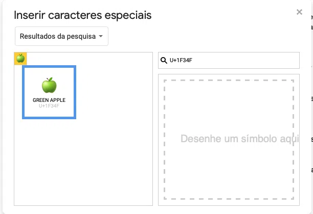 Captura de tela da janela inserir caracteres especiais. No campo de busca, o código u+1f34f. À esquerda, o símbolo green apple em destaque.