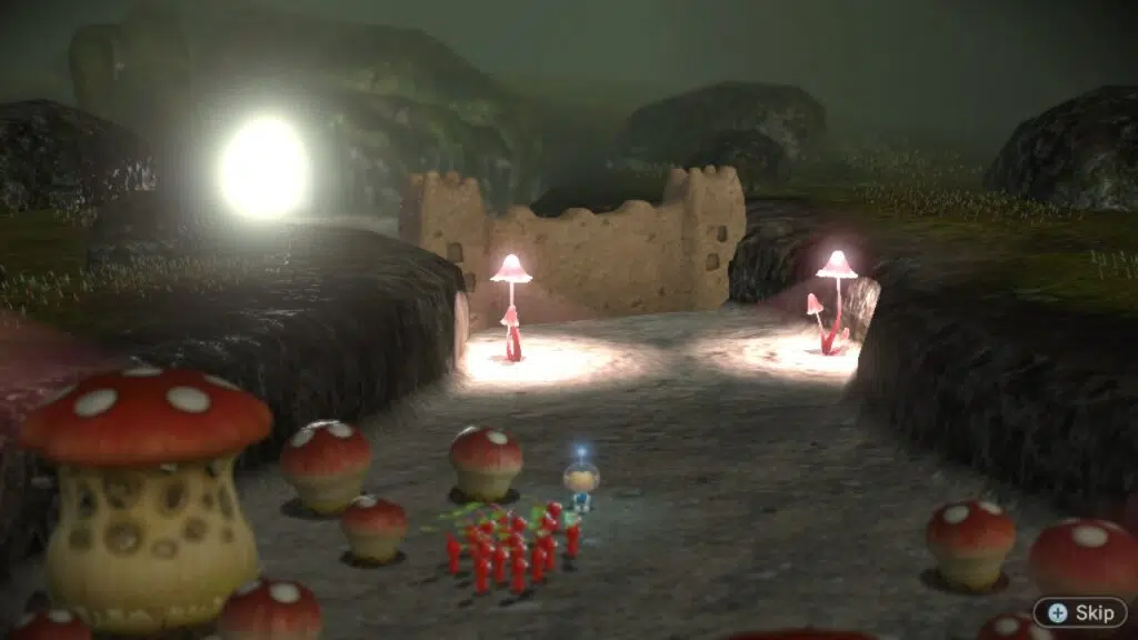 Alph e alguns pikmin encaram um obstáculo.