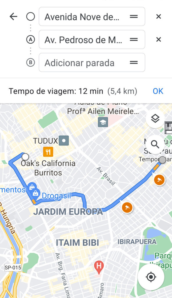 Dicas e truques para google maps. Captura de tela do aplicativo google maps com uma rota traçada entre dois pontos em mapa da cidade de são paulo. Ponto de partida: av nove de julho. Ponto a: av. Pedroso de morais. Logo acima, os pontos de partida e a com seus respectivos endereços e o ponto b com campo para adicionar parada