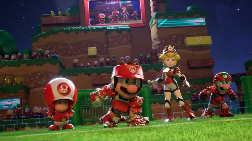 Imagem do time do mario, com ele, toad, peach e luigi em mario strikers battle league