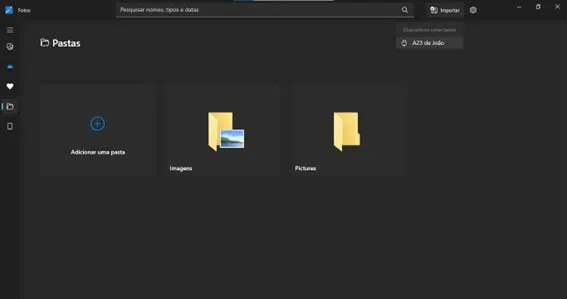 Página inicial do aplicativo fotos do windows, com opções de pastas dispostas ao centro da tela. No topo, é possível verificar os dispositivos conectados ao computador para acesso de mídias.