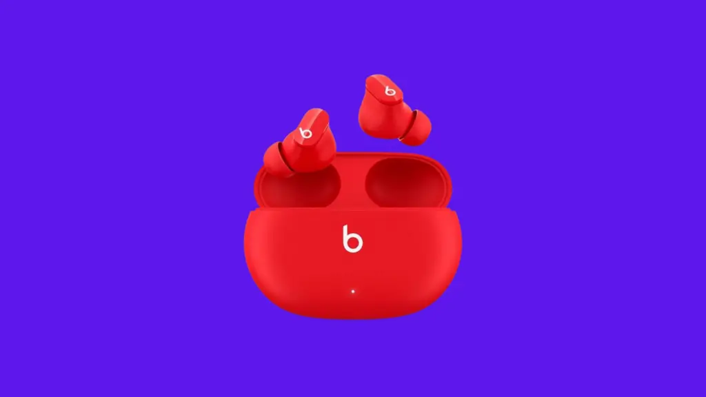 Beats studio vermelho, earbuds da apple em fundo azul