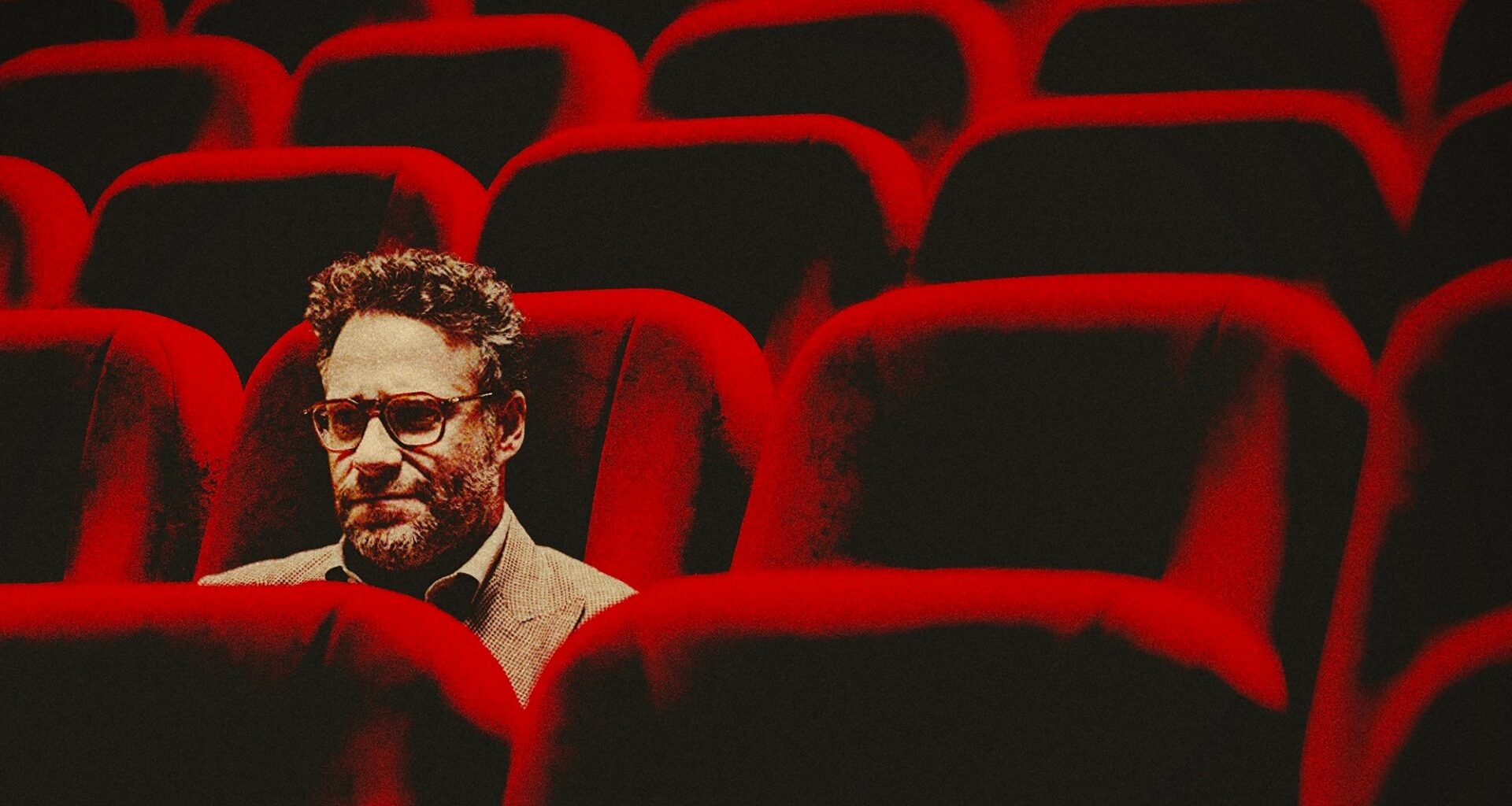 Propaganda de o estúdio mostrando o ator seth rogen sentado em um banco de teatro veja os lançamentos do apple tv+ em março de 2025